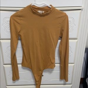 tan longsleeve bodysuit